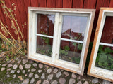 Fyra spröjsade fönster med karm